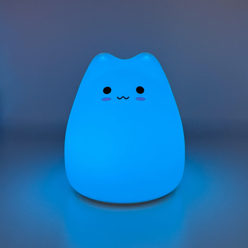 HikeWare silicone cat-shaped night light lamp illuminating softly, ideal for cozy bedrooms or children's rooms.