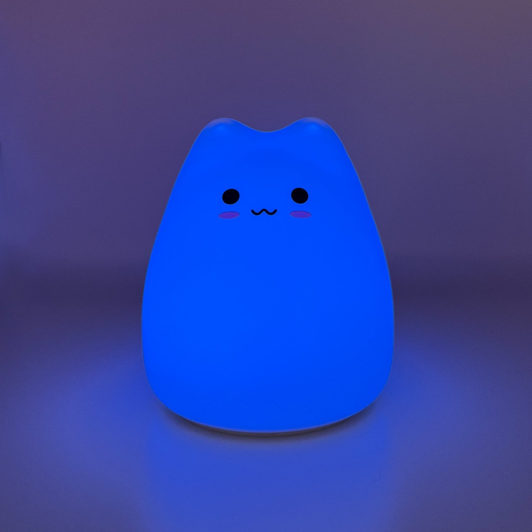 HikeWare silicone cat-shaped night light lamp with soft glow, perfect for cozy bedroom or nursery decor.