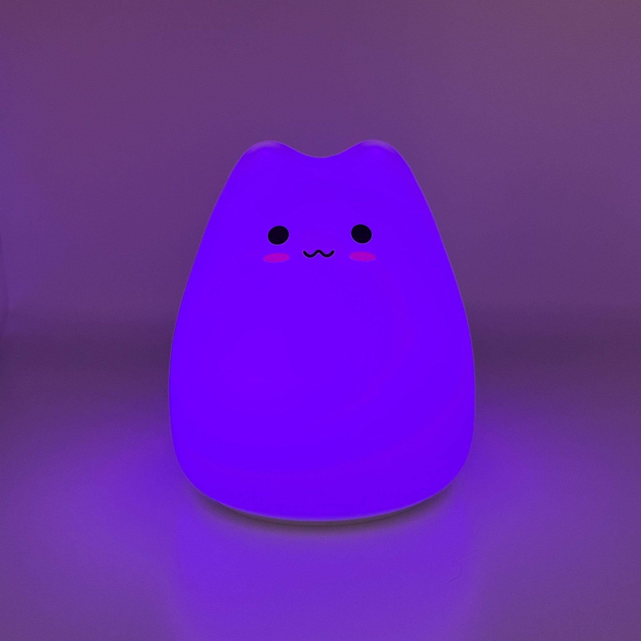 HikeWare silicone cat-shaped night light lamp emits soft glow, perfect for cozy bedroom or nursery decor.