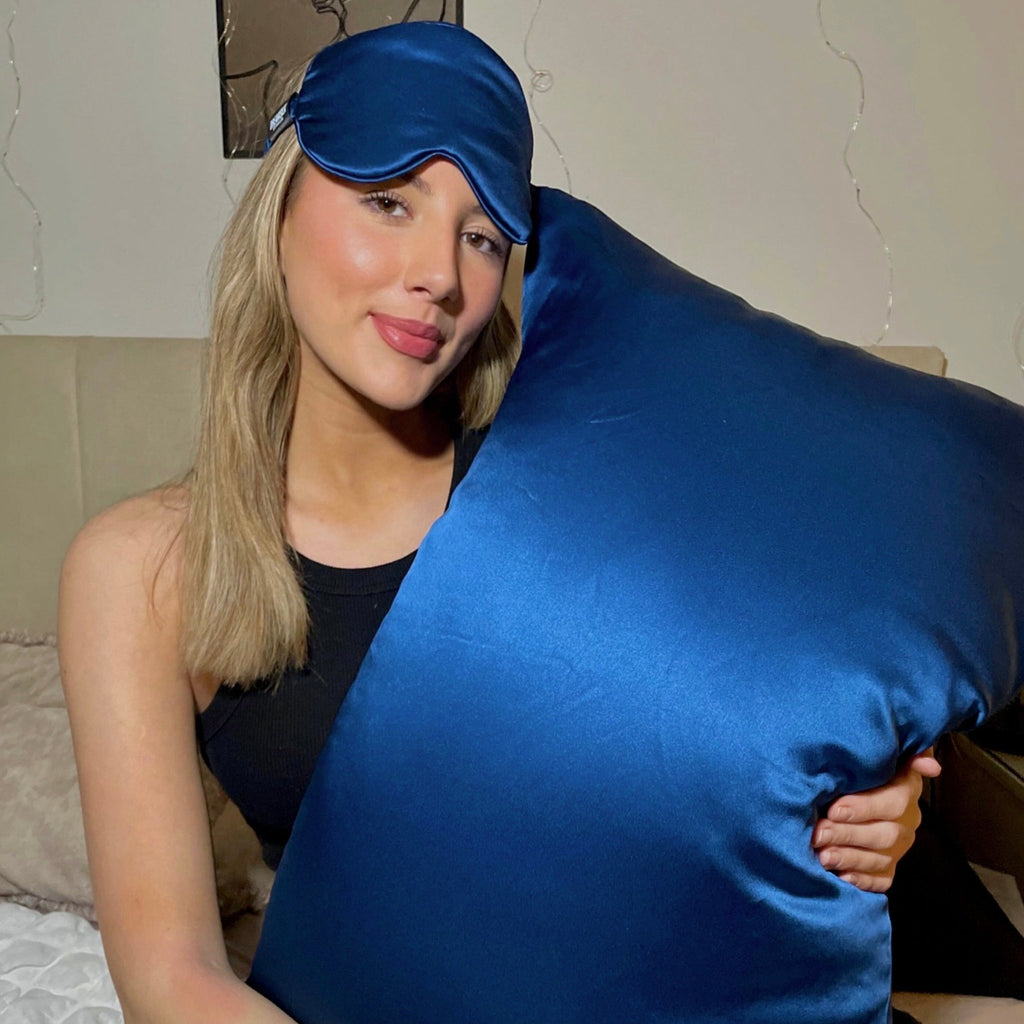 DREAMSILK luxury silk pillowcase in smooth, shiny silk fabric with a soft, elegant appearance.