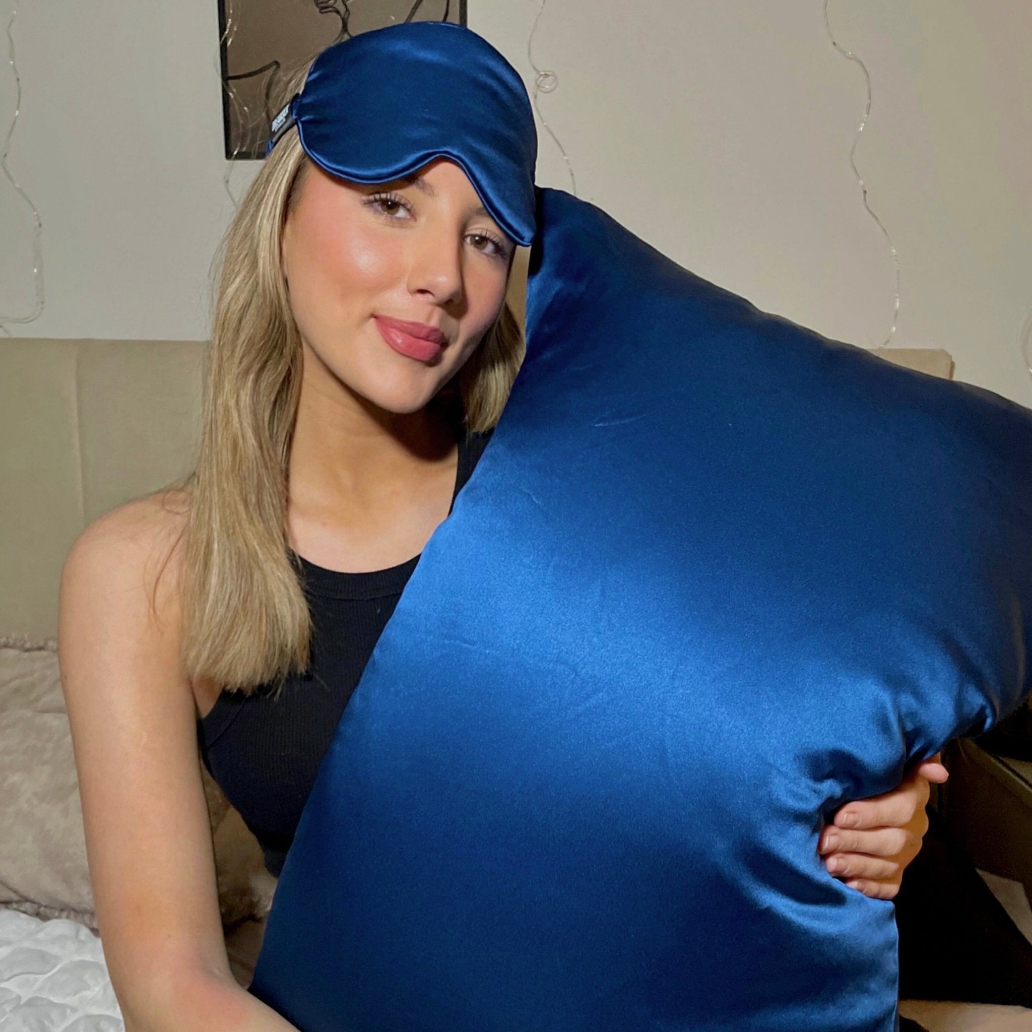 DREAMSILK luxury silk pillowcase in smooth, shiny silk fabric with a soft, elegant appearance.