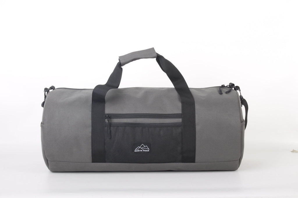 North Peak Crest Holdall shown with adjustable shoulder strap and spacious main compartment for travel or gym use.