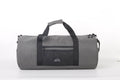 North Peak Crest Holdall shown with adjustable shoulder strap and spacious main compartment for travel or gym use.