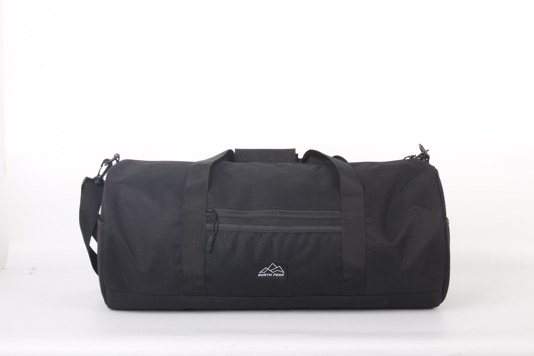 North Peak Crest holdall with multiple compartments, durable fabric, and carrying handles, ideal for travel or gym use.
