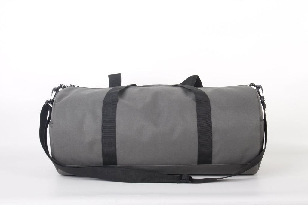 North Peak Crest Holdall, durable travel bag with multiple compartments, showing its spacious interior and sturdy handles.