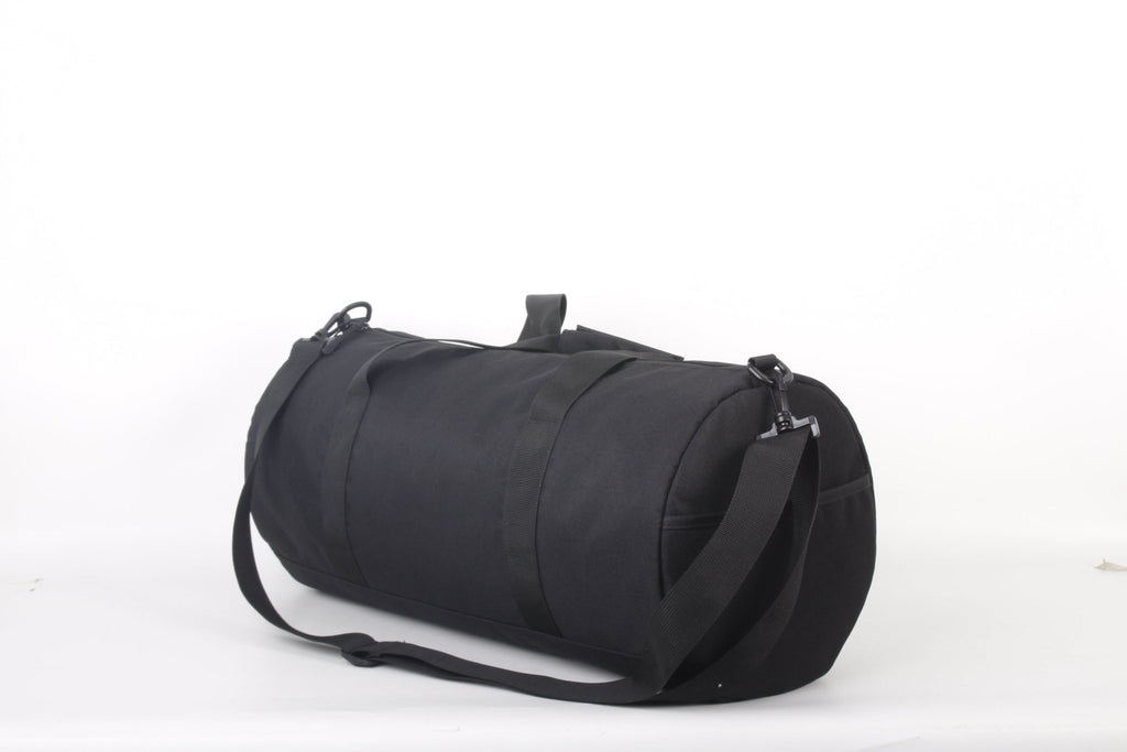 North Peak Crest Holdall with adjustable straps and multiple compartments, suitable for travel and gym use.