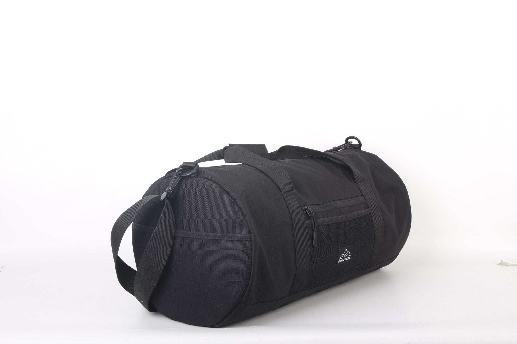 North Peak Crest Holdall showing its spacious main compartment and durable fabric for travel or gym use.