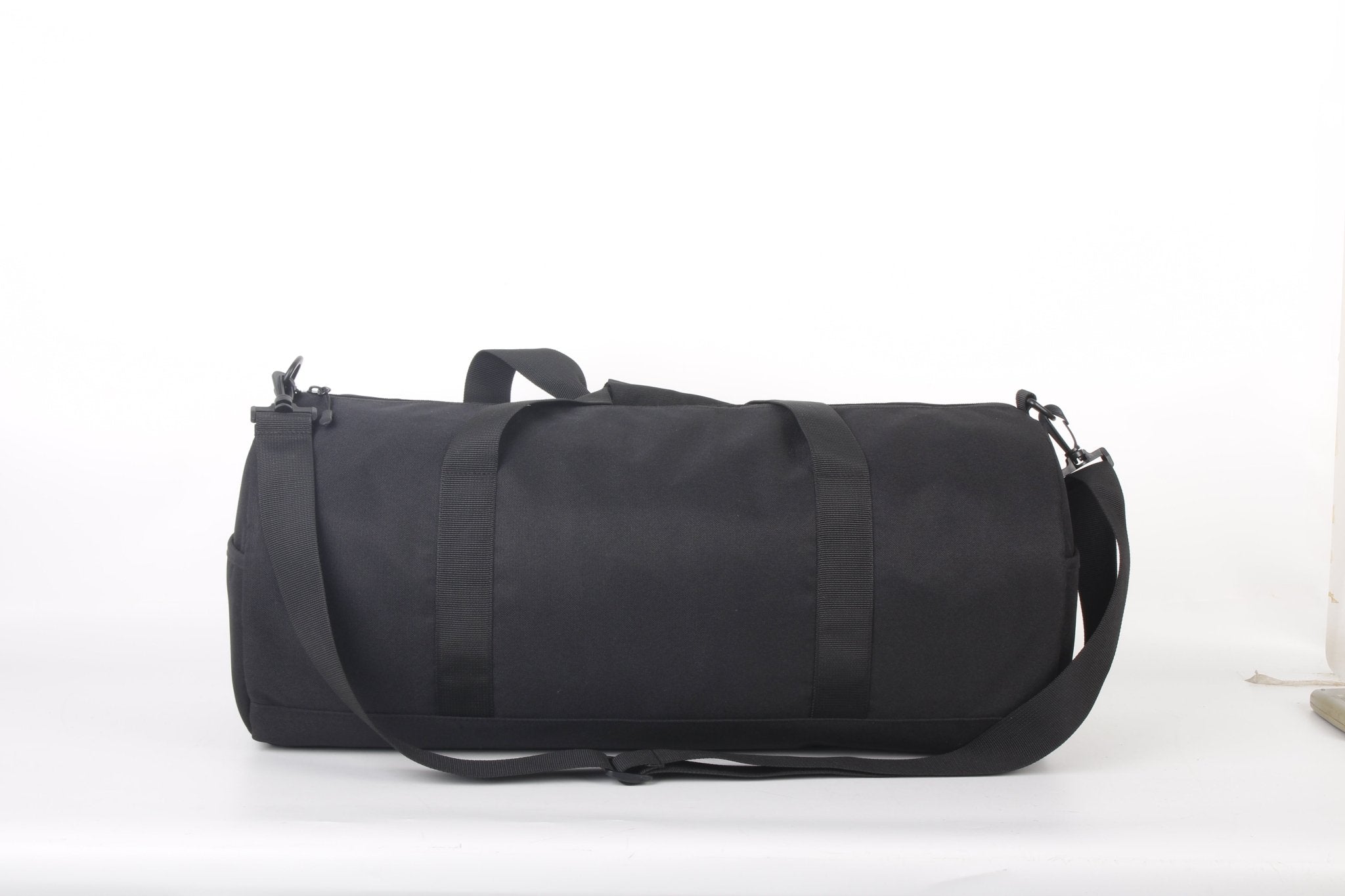 North Peak Crest Holdall with zippered compartments and adjustable straps, designed for versatile travel and sports use.