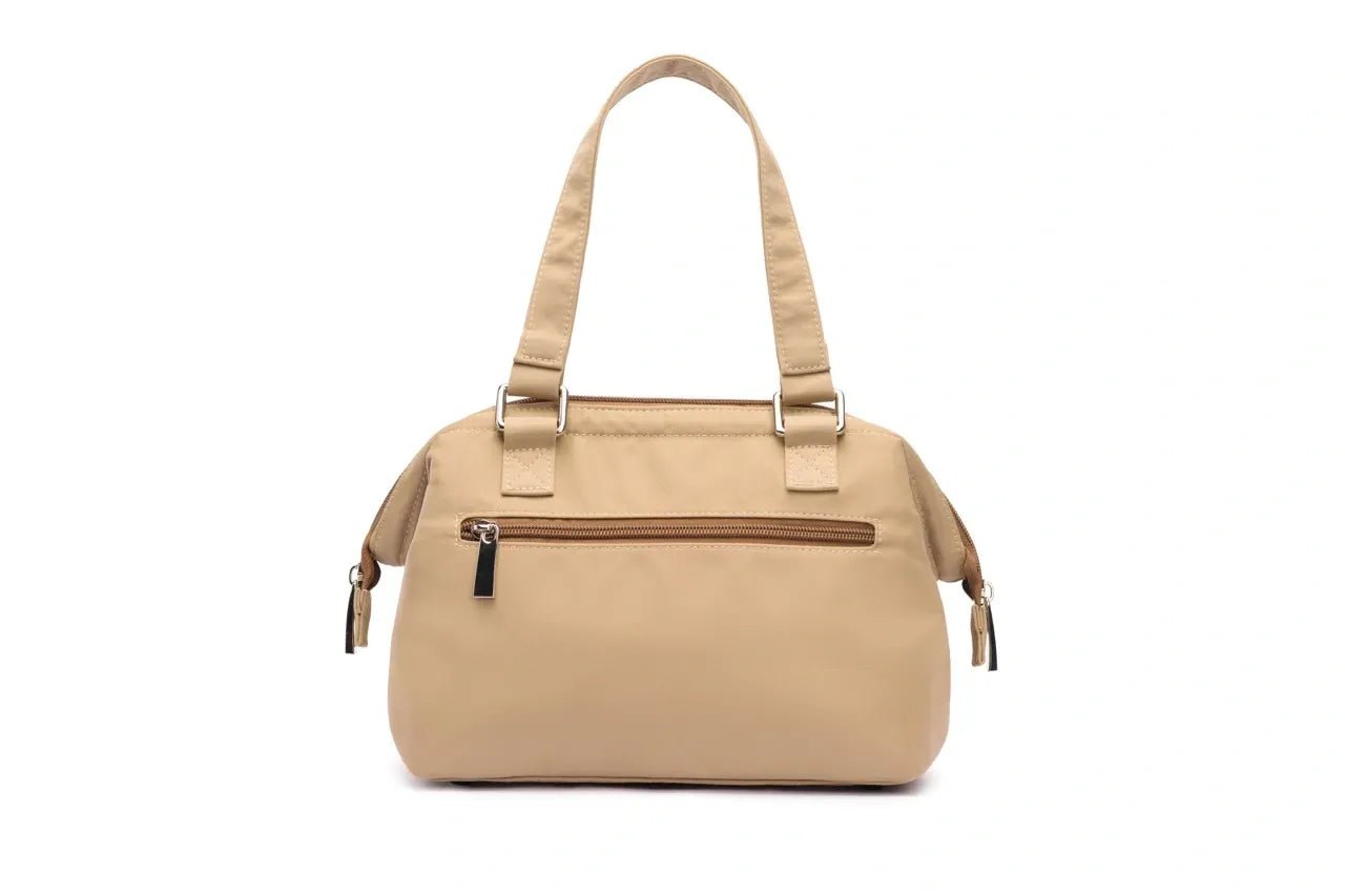 Small STÆRKE Mini In-Gym Bag with compact design, featuring zipper closure and adjustable strap for easy gym essentials.