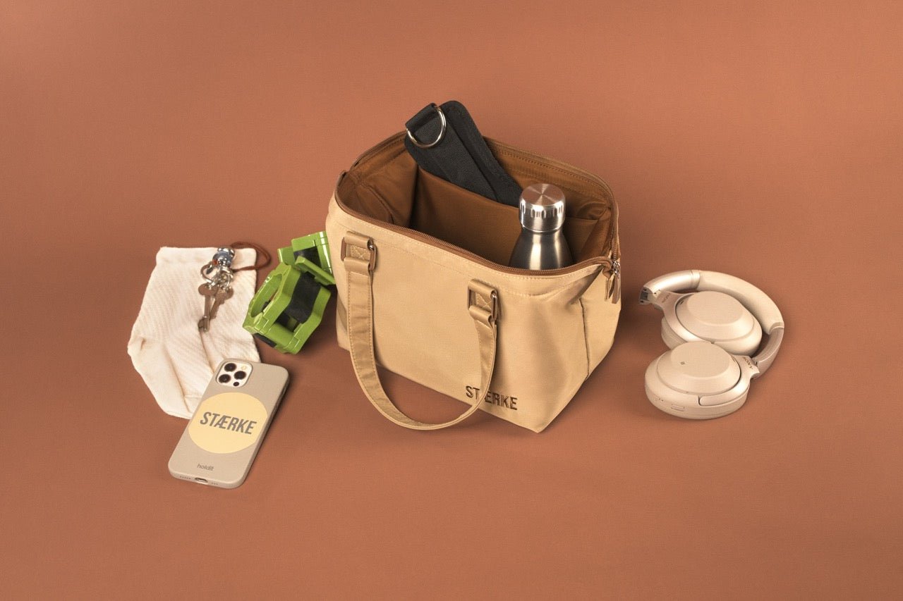 Mini gym bag by STÆRKE featuring a compact design with sturdy handles and a zippered main compartment for gym essentials.