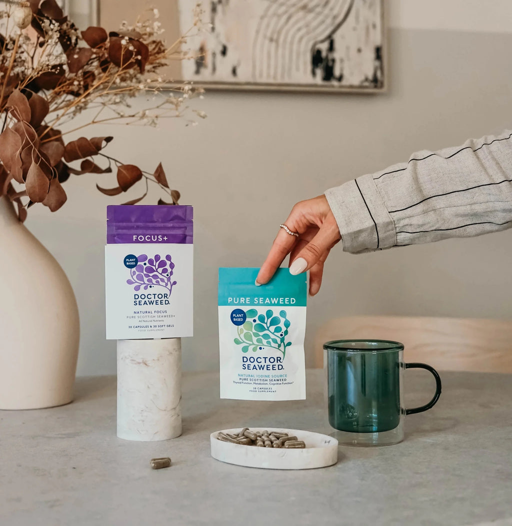Doctor Seaweed Mental Resilience Duo package with supplement bottles and a person practicing mindfulness in a serene setting.