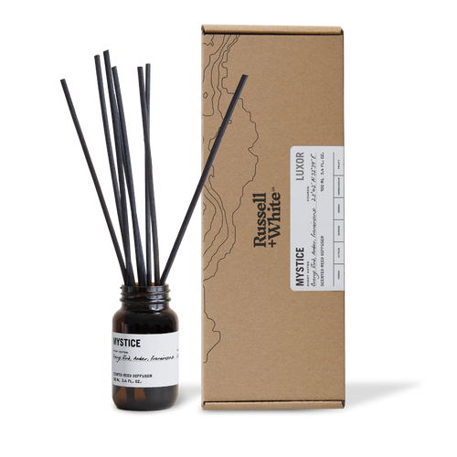 Russell + White Mystice 100ml reed diffuser with elegant glass bottle and natural reed sticks for home fragrance.