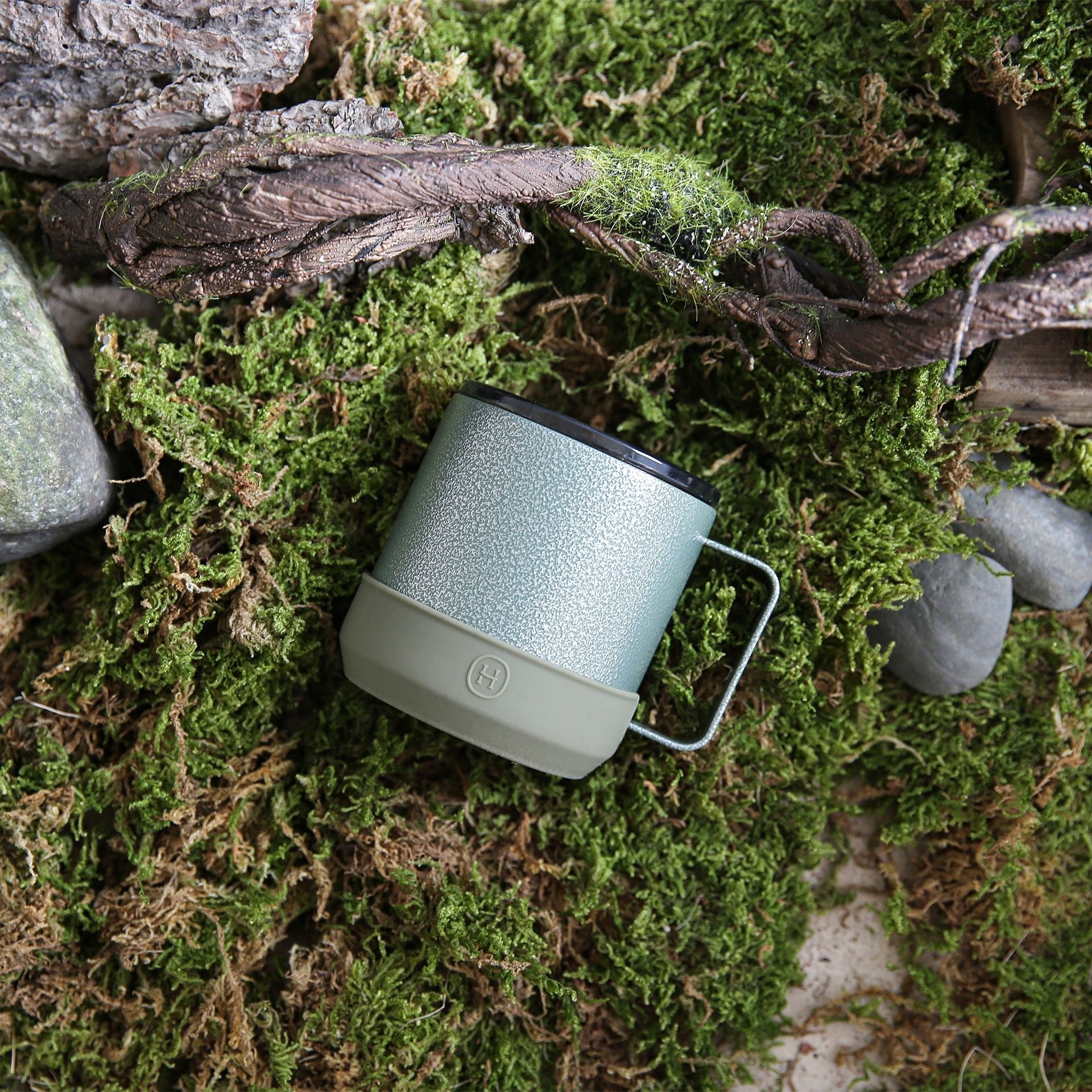 Army green HYDY 10 oz camp mug with sturdy handle and smooth finish, ideal for outdoor camping and outdoor adventures.