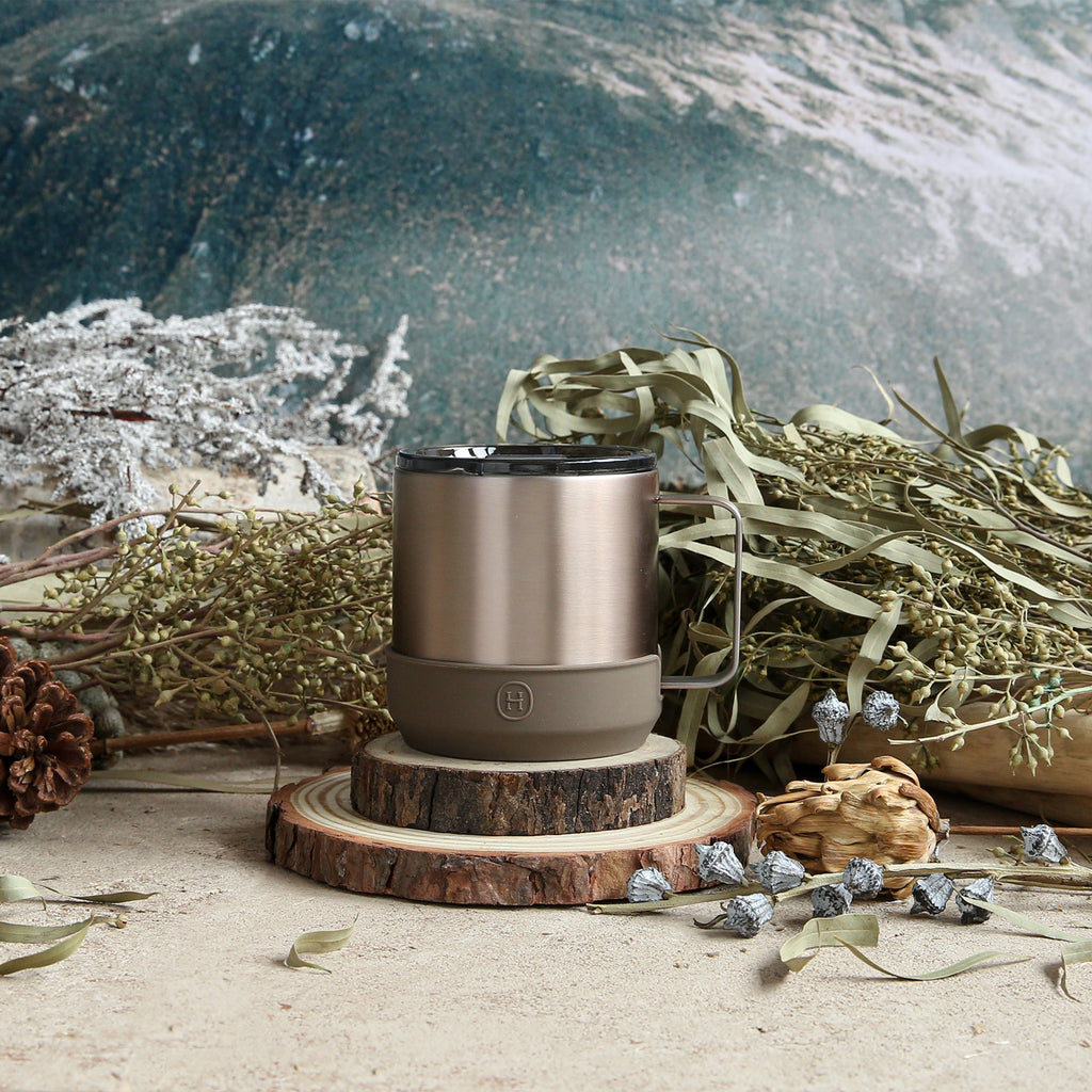 Metallic fir-colored HYDY camp mug with 10 oz capacity, featuring a sturdy handle and outdoor-inspired design.
