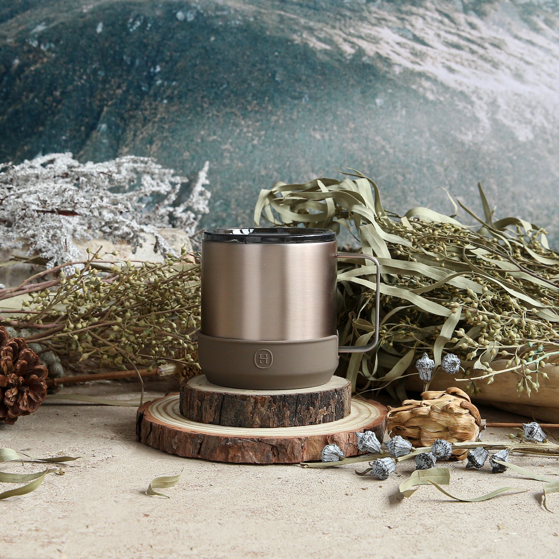 Metallic fir-colored HYDY camp mug with 10 oz capacity, featuring a sturdy handle and outdoor-inspired design.