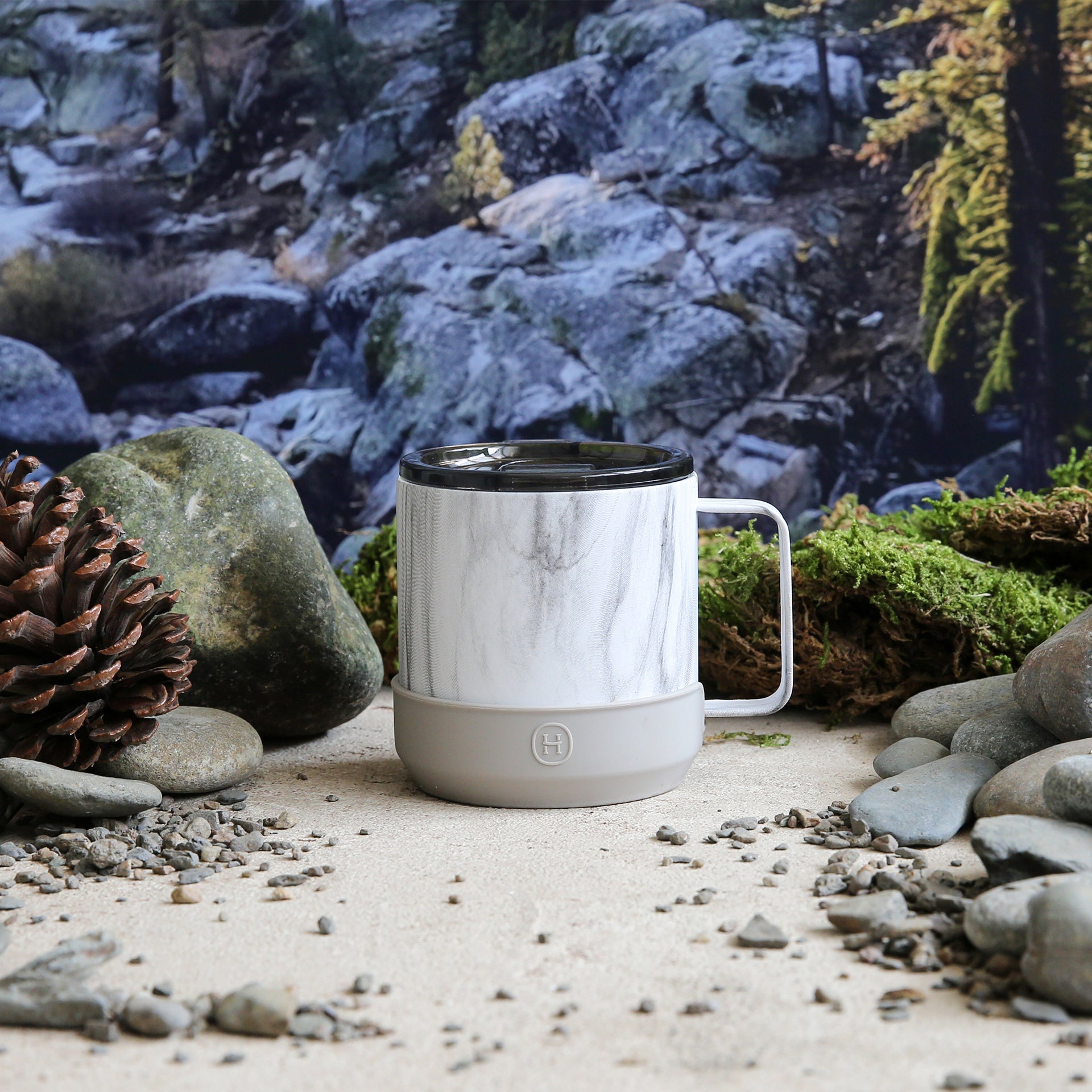 White marble HYDY camp mug with eucalyptus design, 10 oz size, sturdy ceramic material, ideal for outdoor camping and travel.