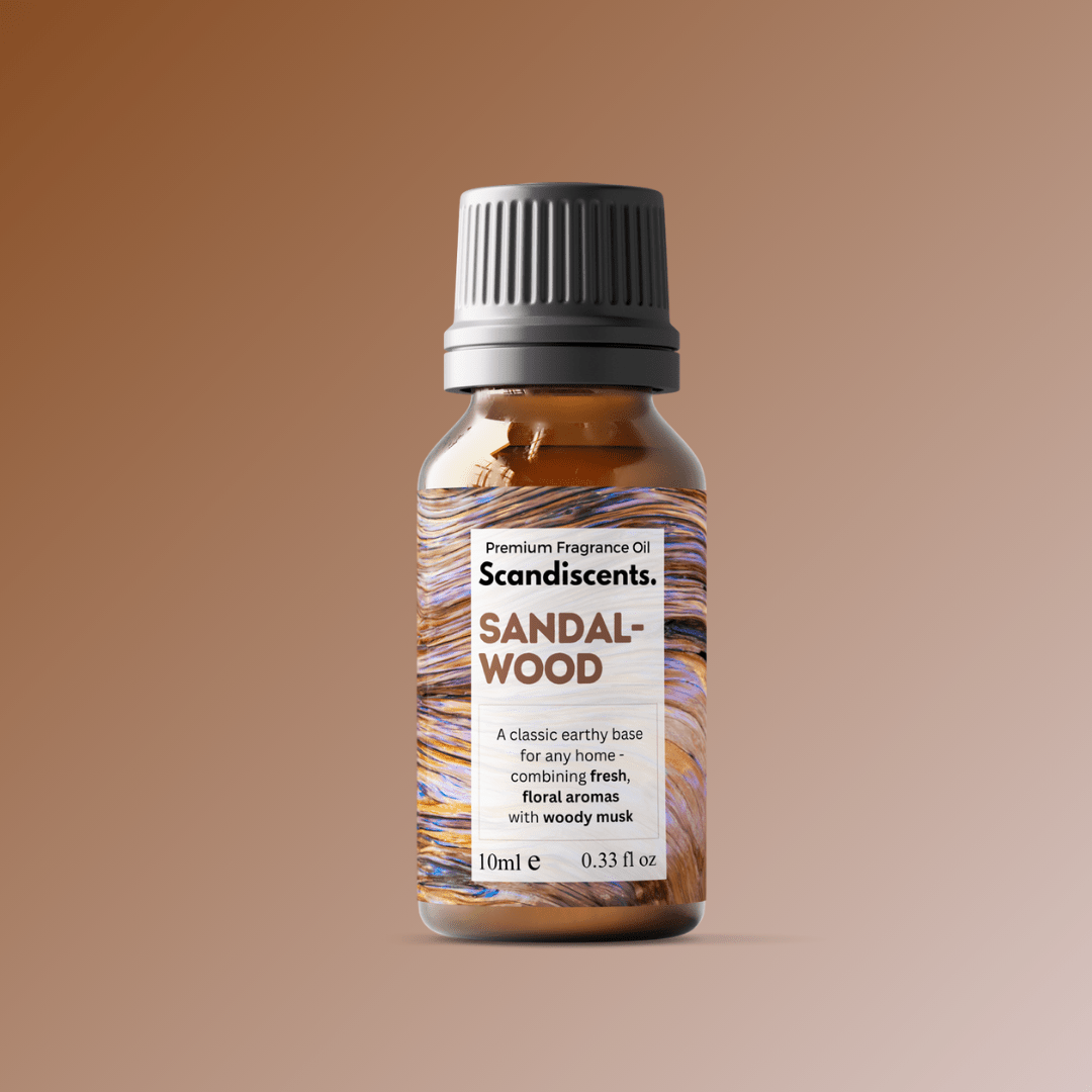 Scandiscents sandalwood fragrance oil bottle with amber-colored liquid against a neutral background.