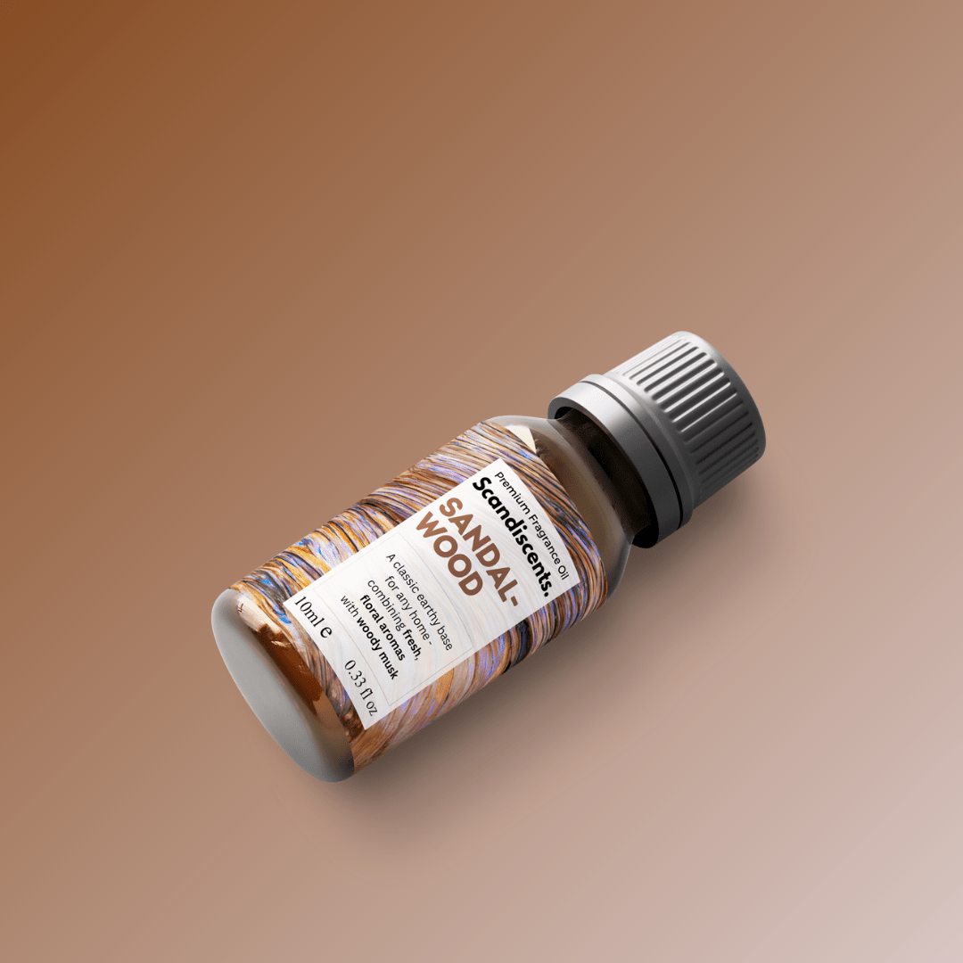 Scandiscents sandalwood fragrance oil in a clear glass bottle with a black cap, displayed against a neutral background.