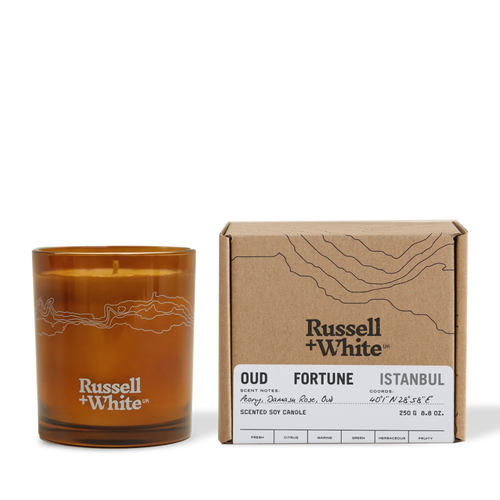 Russell + White Oud Fortune scented soy candle in 250g jar, featuring a warm, luxurious fragrance with an elegant design.