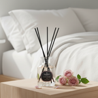 Parks Candles Rose Reed Diffuser 100ml with elegant glass bottle and natural reed sticks for floral home fragrance.
