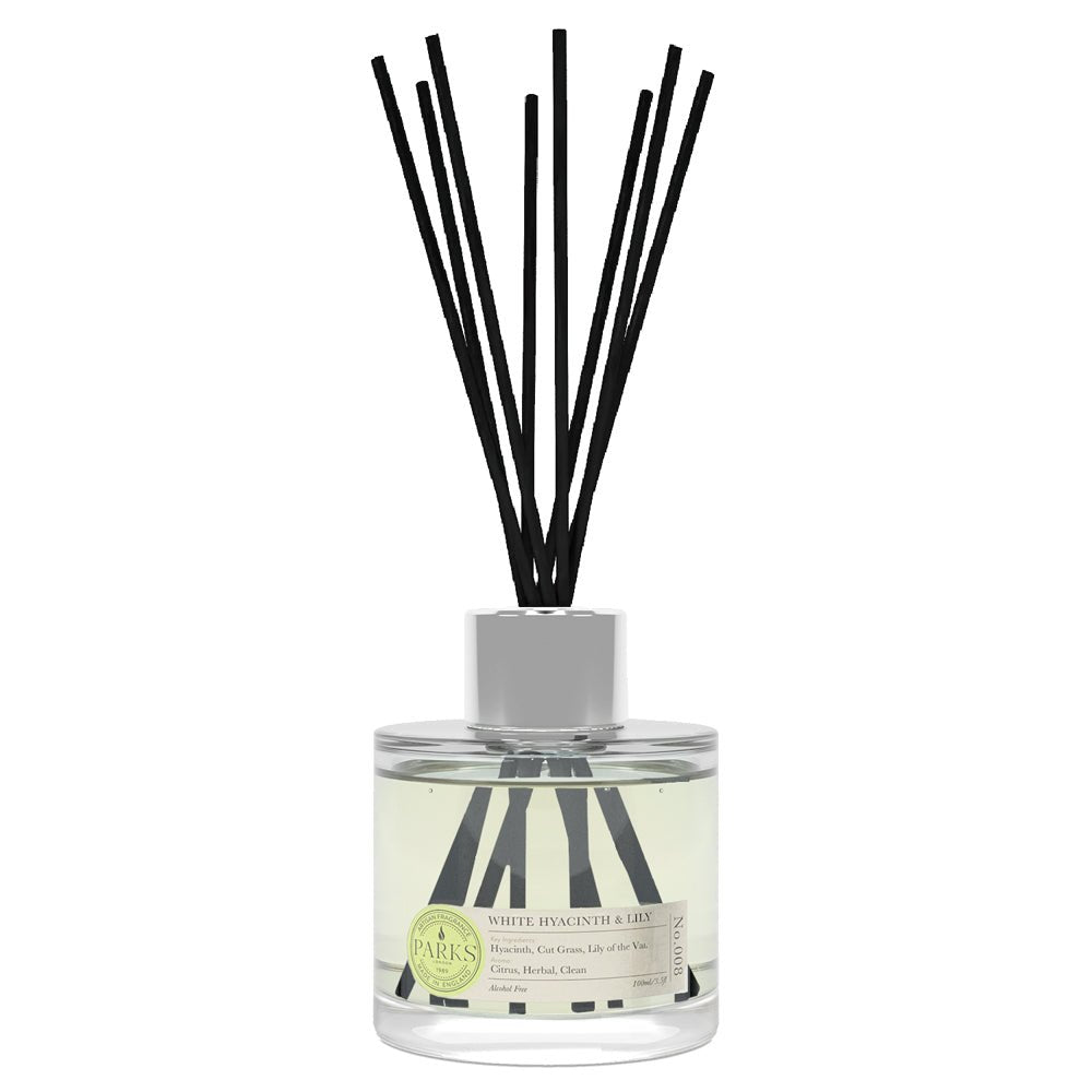 White hyacinth and lily reed diffuser by Parks Candles, 100ml decorative glass bottle with diffuser reeds in the image.