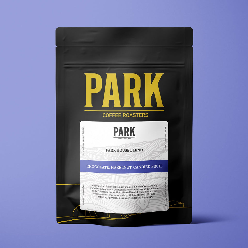 A bag of Park House Blend roasted coffee by Park Coffee, showing the label with a rich coffee bean design on the packaging.