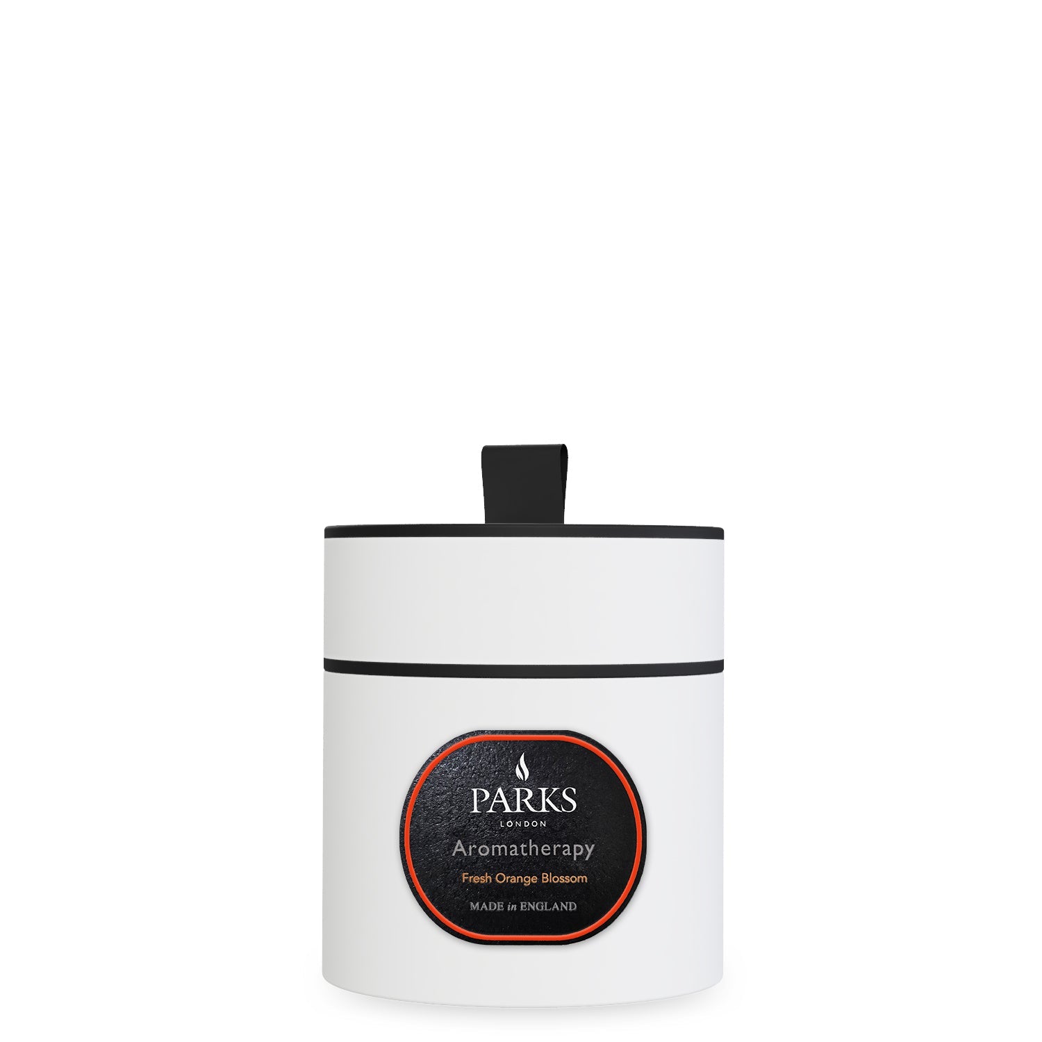 Parks Candles Fresh Orange Blossom scented candle in a 220g glass jar with a white label, placed on a cozy surface.