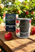 Apple Bottom Jeans Candle by Musketeers featuring apple and pear scent, with a stylish candle design against a neutral background.