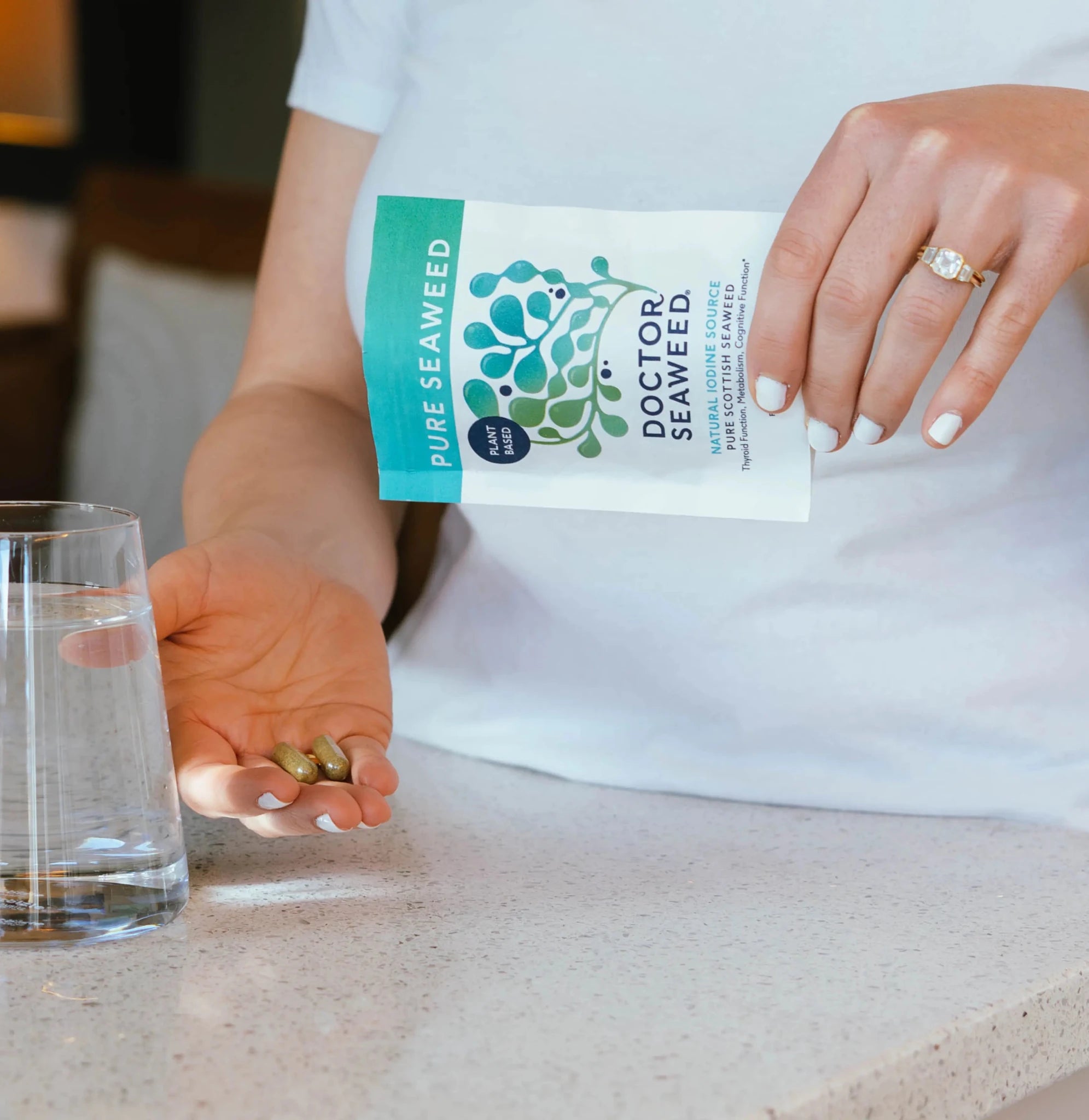 Pure organic seaweed supplement by Doctor Seaweed, showing dried seaweed flakes in a natural setting.