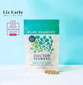 Doctor Seaweed Pure Organic Seaweed supplement in a clear glass jar with dried seaweed flakes inside.