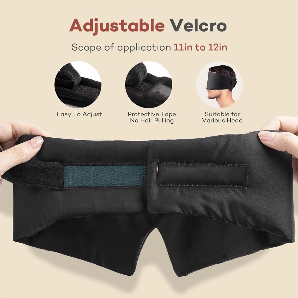 Black silk sleep mask by DREAMSILK with a smooth, luxurious design for complete blackout and restful sleep.