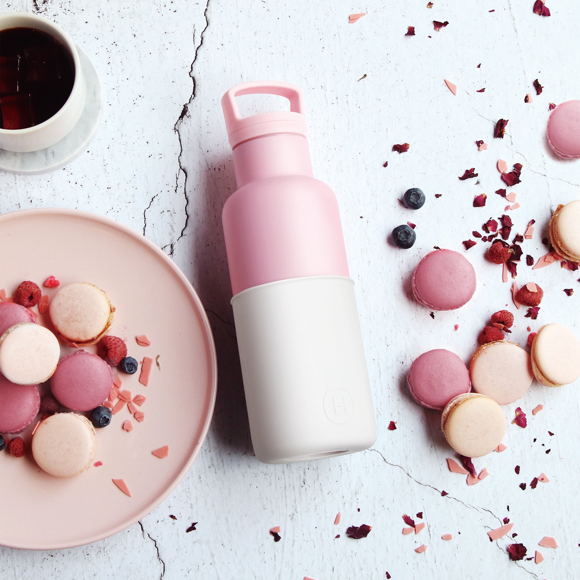 HYDY Rose Pink Snow 16 oz bottle with white cap and clear body, showcasing its vibrant pink design and compact shape.