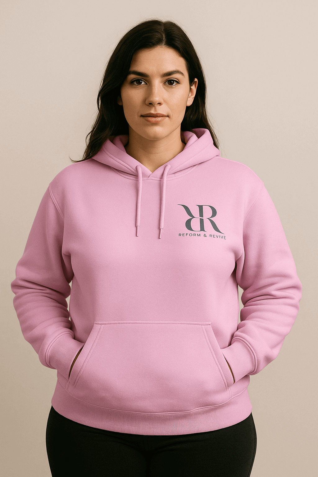 Pink Reform and Revive R&R hoodie with comfortable fit and logo design, casual and cozy clothing for everyday wear.