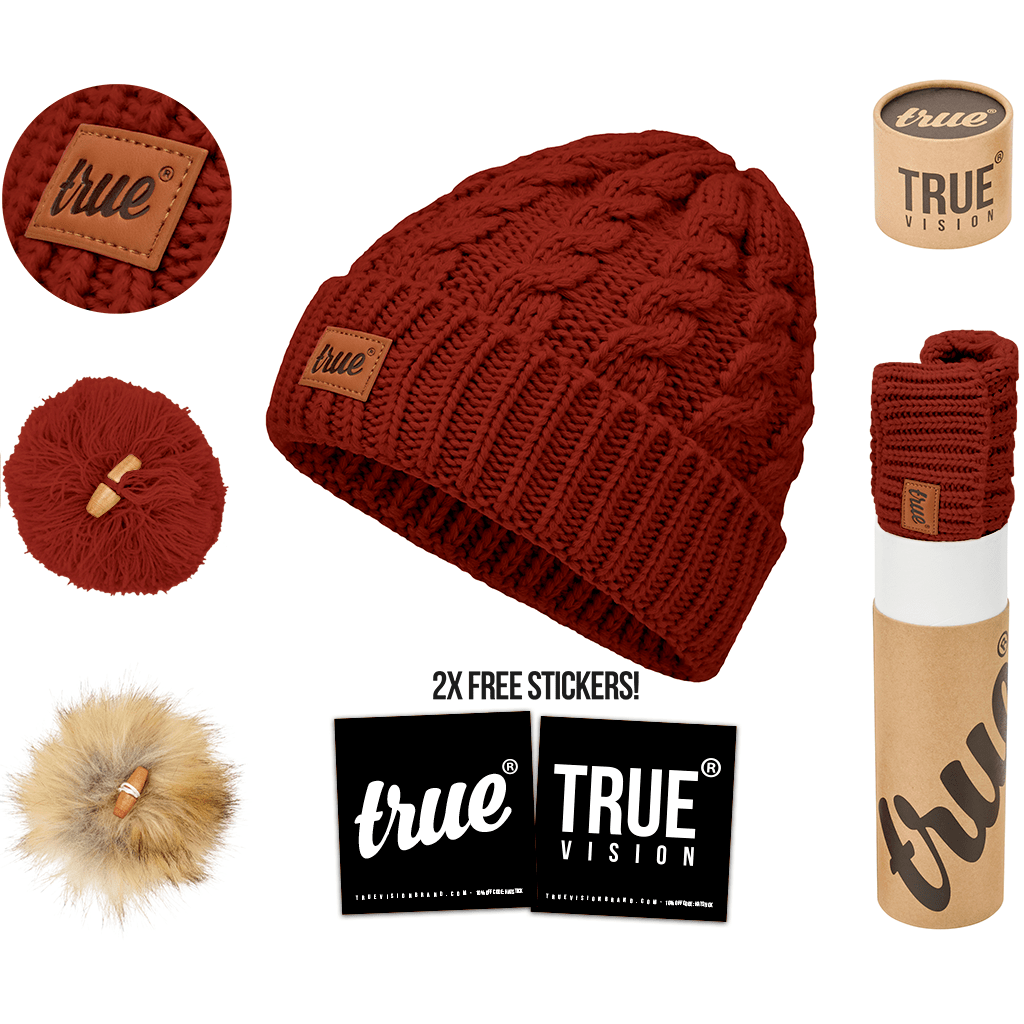 Rust red bobble beanie hat by truevisionbrand featuring a cozy knit design with a large fluffy pom-pom on top.
