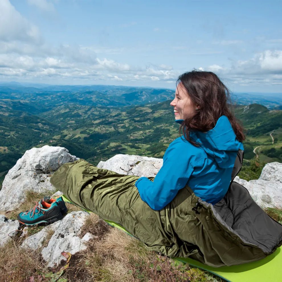 HikeWare lightweight 3-season sleeping bag for adults, ideal for backpacking and camping in various weather conditions.
