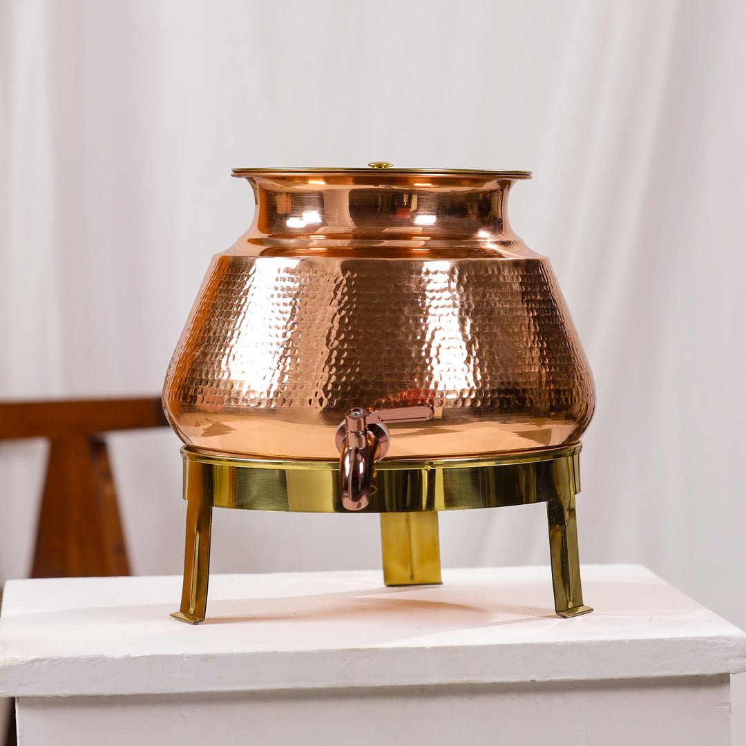 Handcrafted 8L pure copper water dispenser with hammered finish and tap, Ayurvedic style by SAMA Homes.