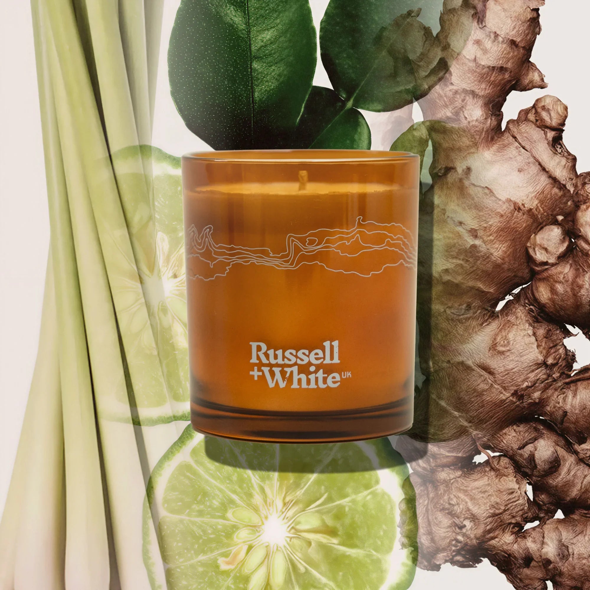 Eastern Garden scented soy candle by Russell + White, showcasing a decorative candle with floral and herbal scent notes.
