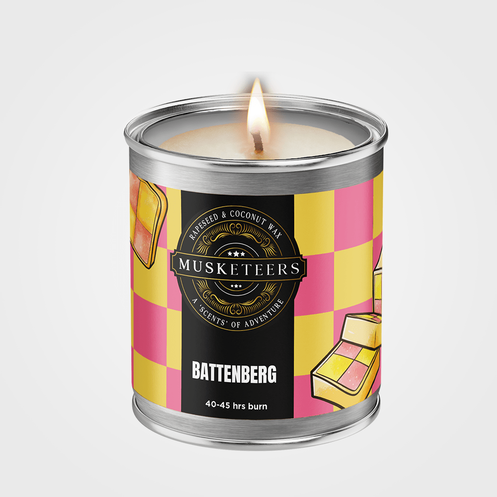 Musketeers Battenberg scented candle with sweet almond cake aroma, featuring a decorative candle with pink and white layers.