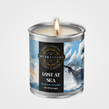 Musketeers Lost at Sea coastal candle with ocean and sea salt scent, featuring a masculine fresh design and nautical-inspired packaging.