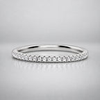Sterling silver thin eternity ring with 1.2 mm width, featuring a continuous row of small sparkling stones, by Vianne Jewellery