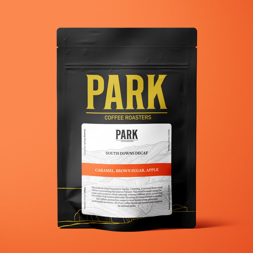 Roasted South Downs Decaf Blend coffee beans by Park Coffee shown in a close-up image.