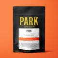 Roasted South Downs Decaf Blend coffee beans by Park Coffee shown in a close-up image.