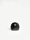 White sports cap by Third Shot UK, designed for padel and pickleball, featuring a breathable, sporty style with a curved brim.