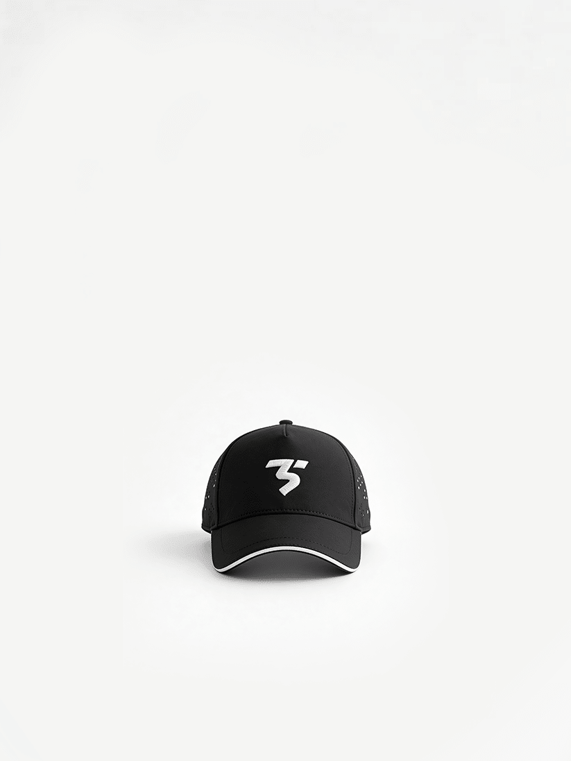 White sports cap by Third Shot UK, designed for padel and pickleball, featuring a breathable, sporty style with a curved brim.