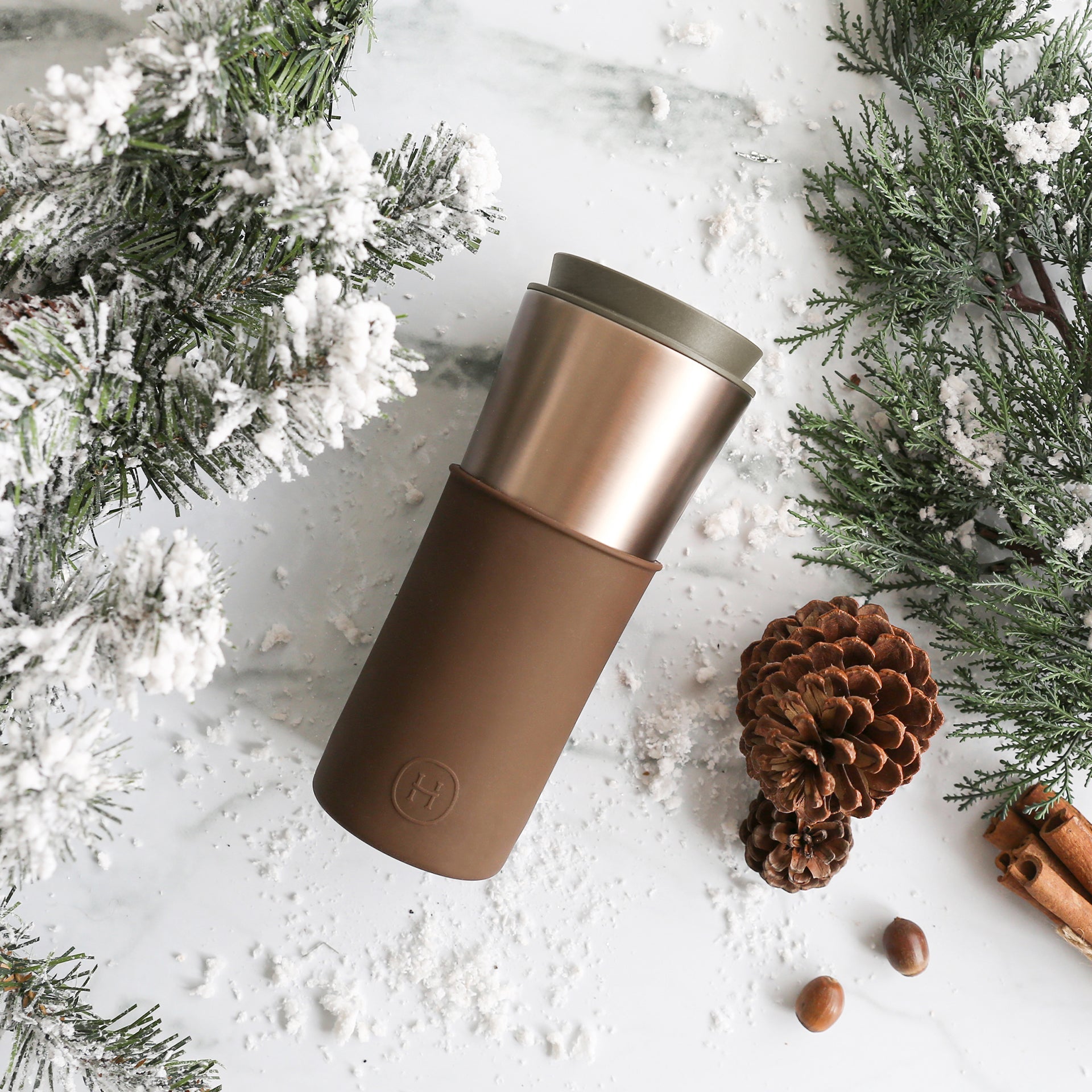 Hydy Metallic Fir Mocha 15 oz travel mug with stainless steel finish, insulated design, and secure lid for hot beverages.