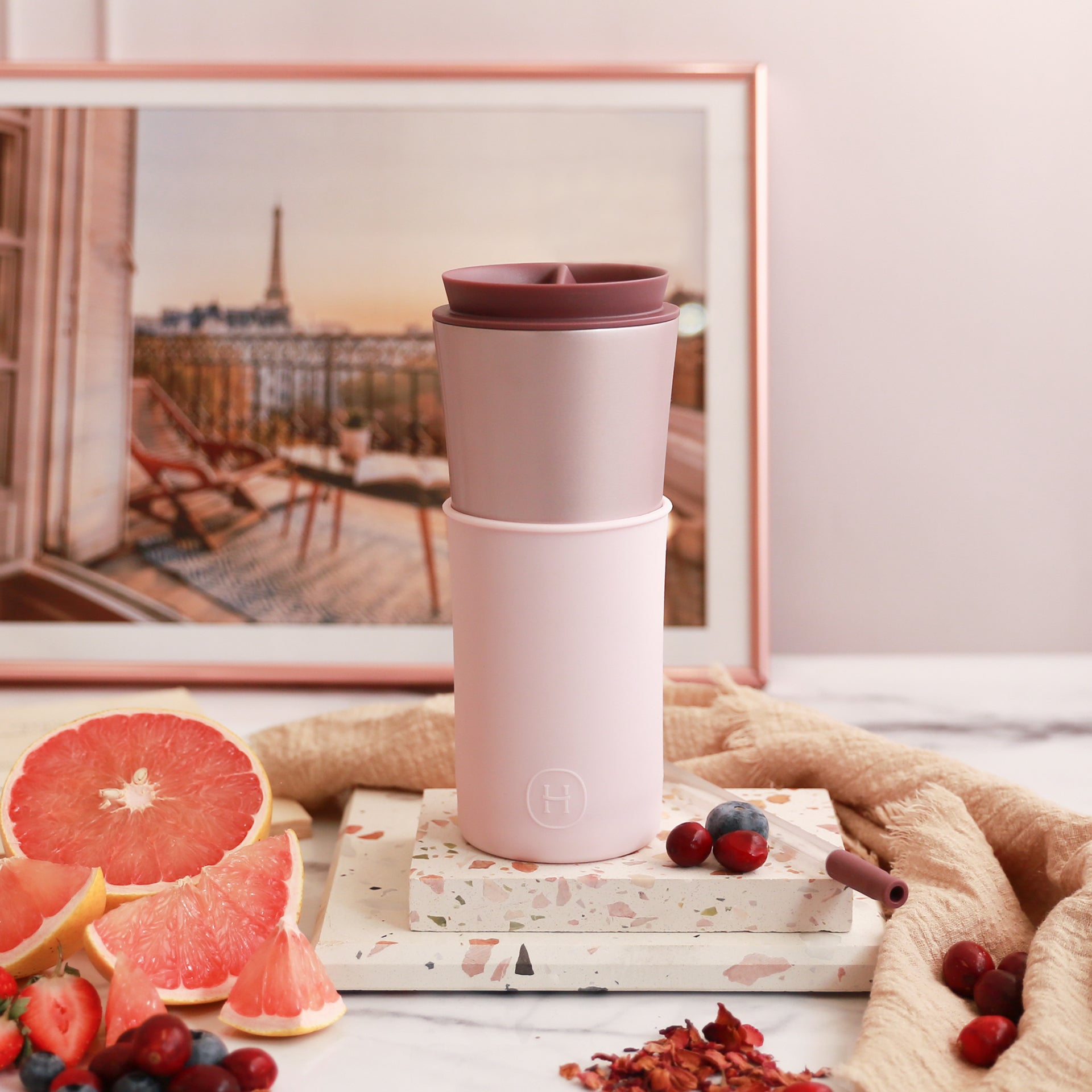 Pink travel mug with cherry blossom design, 15 oz HYDY Pearl Pink Travel Mug for hot and cold beverages.