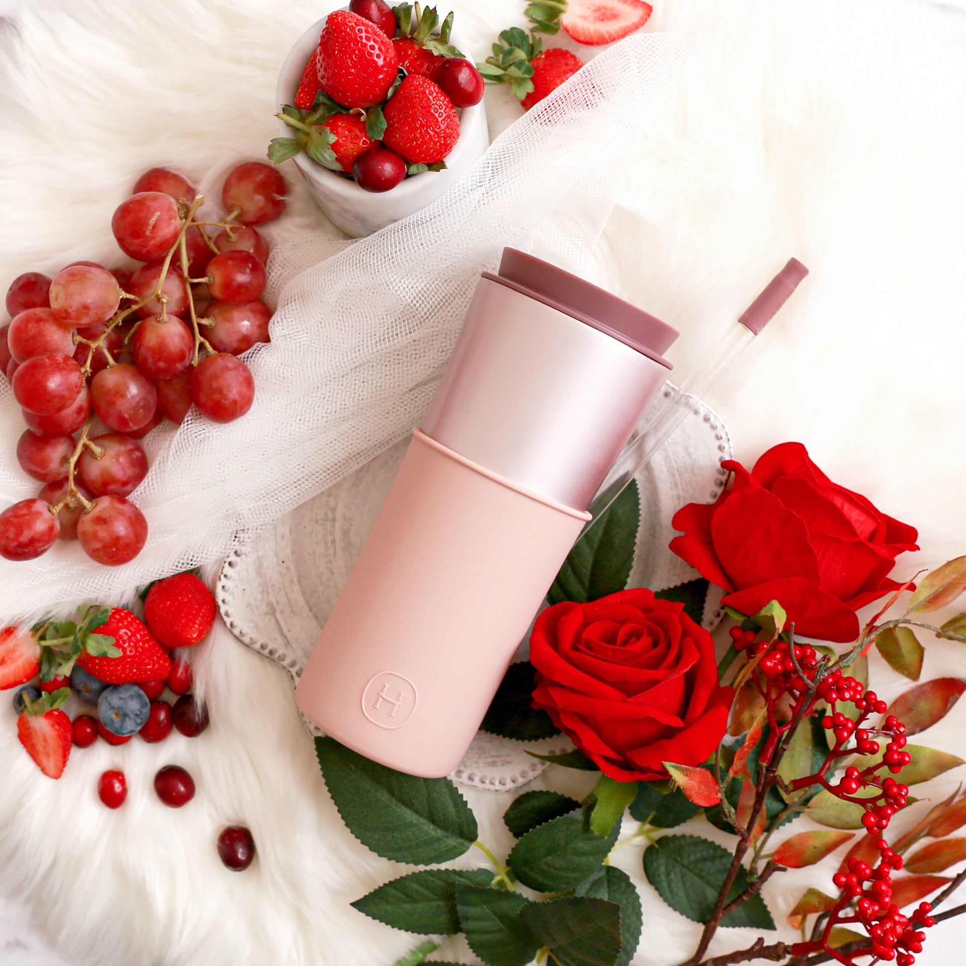 Pink Pearl HYDY 15 oz travel mug with latte-colored exterior and stainless steel lid, designed for hot beverages on the go.