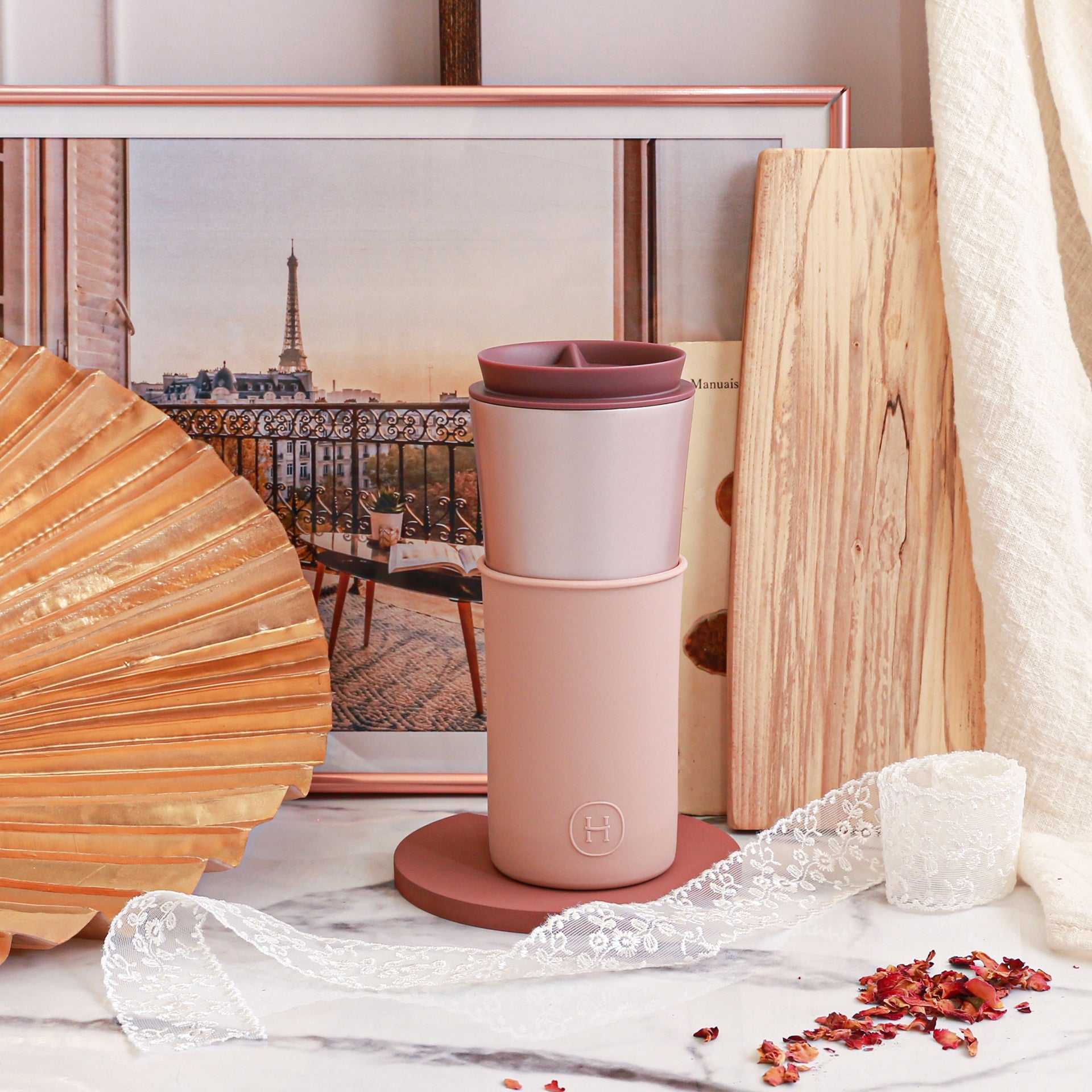 Pink pearl travel mug by HYDY, 15 oz latte style with a sleek design and durable handle, perfect for on-the-go coffee.