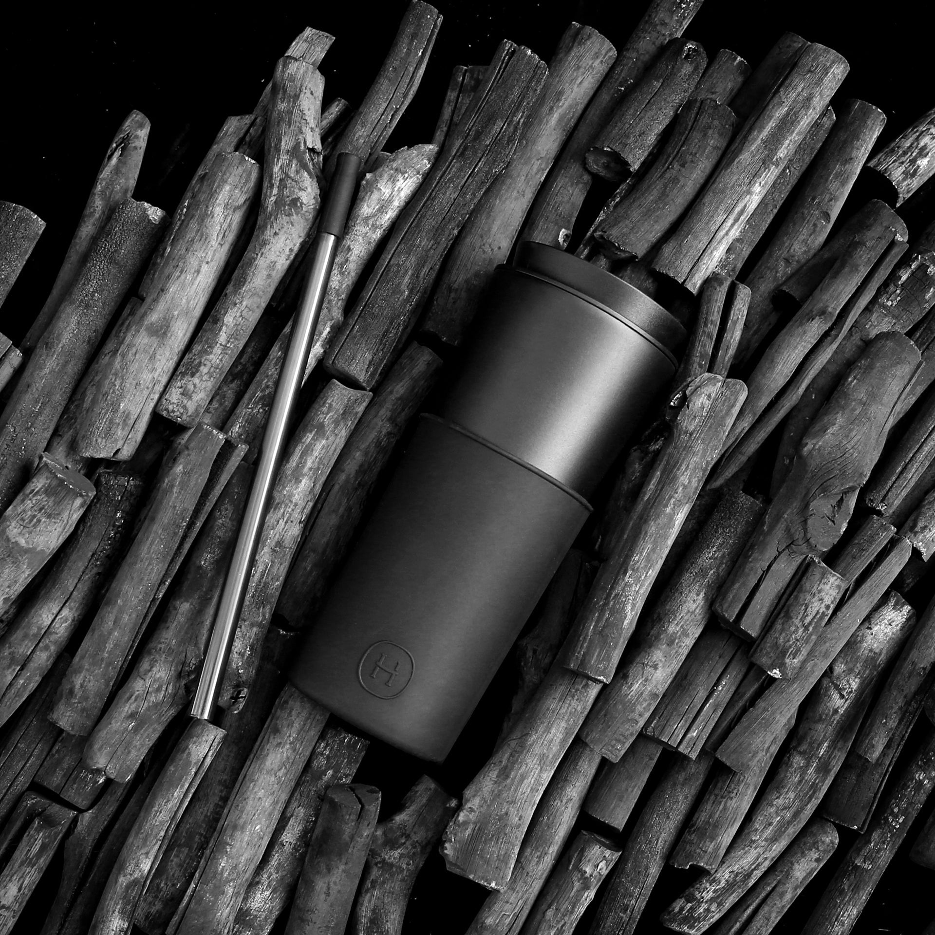 Black HYDY 15 oz Ink Black travel mug with a sleek, matte finish and stainless steel handle, ideal for hot beverages on the go.