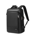 Troop London black slim laptop backpack with tech zone compartments, designed for business and travel use.